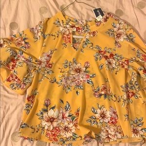 a yellow blouse
